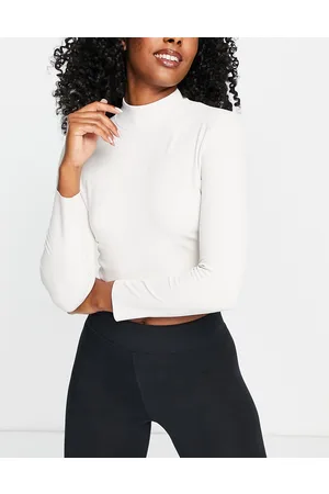 Nike Nike Yoga Luxe Dri-FIT cropped long sleeve top in off