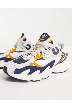 adidas Preppy Varsity' Astir trainers in off with mustard details