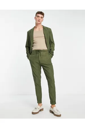 ASOS Tapered jogger waist commuter suit trousers in khaki faux suede
