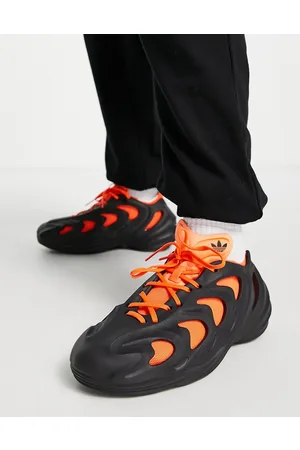 adidas Adifom Q trainers in and orange