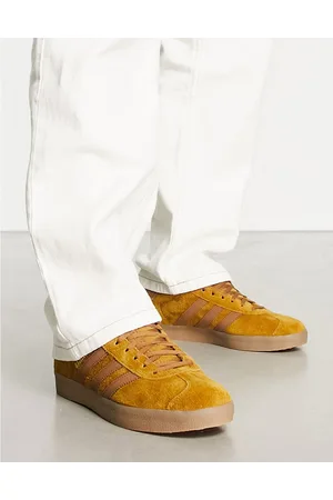 adidas Gazelle gum sole trainers in tan