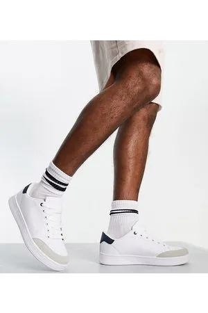Truffle Collection Wide fit lace up trainers in white/navy