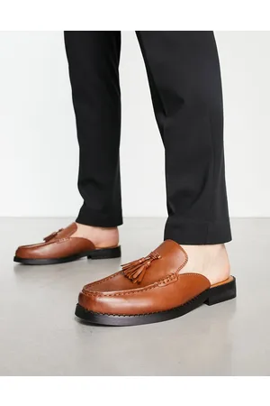 ASOS Backless mule loafers in tan faux leather with tassel detail