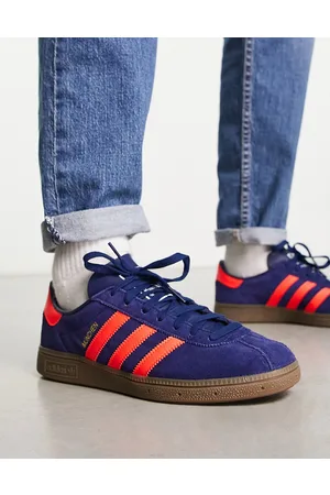 adidas Homem Munchen gum sole trainers in blue and