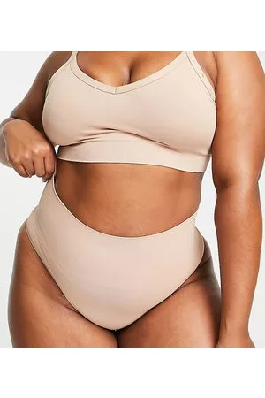 Spanx Seamless contouring thong in beige