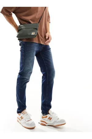 SELECTED Slim tapered fit jeans in mid wash