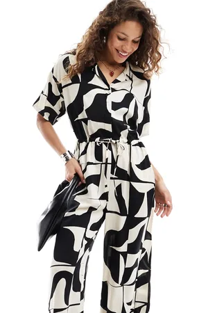 Monki Tie waist jumpsuit in black and white puzzle print