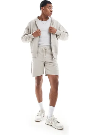 The Couture Club Co-ord raw seam jersey shorts in beige