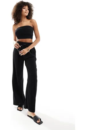 In The Style X Perrie Sian exclusive textured tie waist wide leg beach trousers in