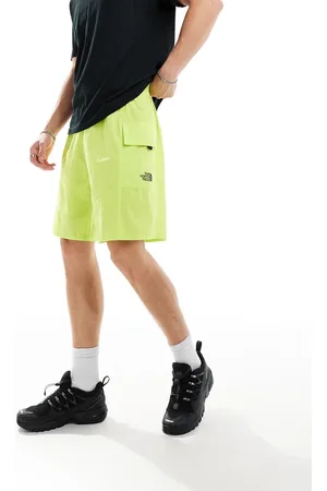 The North Face Logo pocket shorts in lime