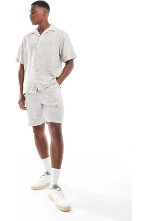 SELECTED Shorts in all over print in cream and navy