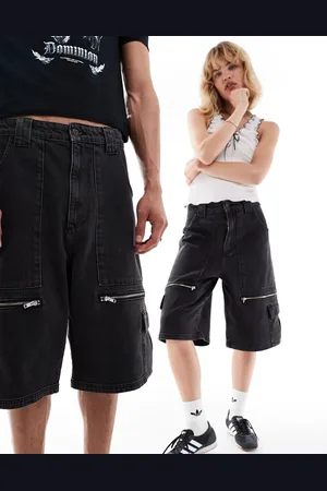 COLLUSION Unisex iconic festival skater jorts with pockets and buckle details in washed black