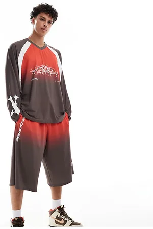 COLLUSION Long line track shorts co-ord in and red