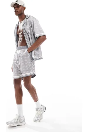 The Couture Club Co-ord emblem print shorts in