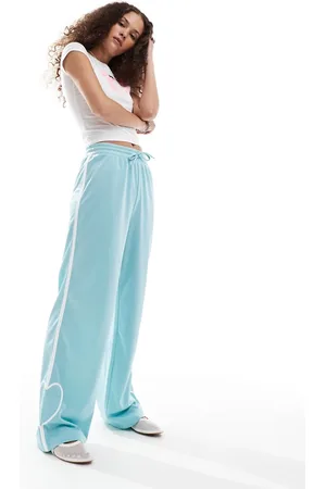 Monki Heart stripe straight leg track pant trouser in light with white stripes
