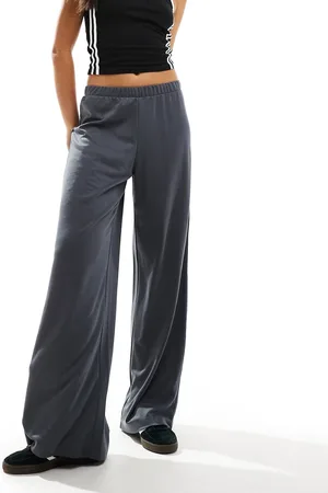 Monki Super soft low waist wide leg jersey trousers in dark