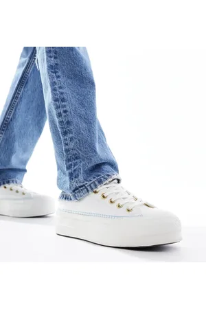Converse Chuck Taylor All Star Lift Ox Platform trainers with crafted stitching in