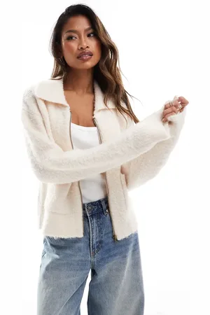 In The Style Knitted zip through pocket detail cardigan in cream