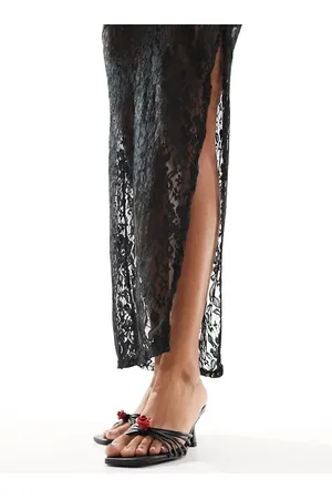 Public Desire Vertigo mid heeled mule with rosette in black