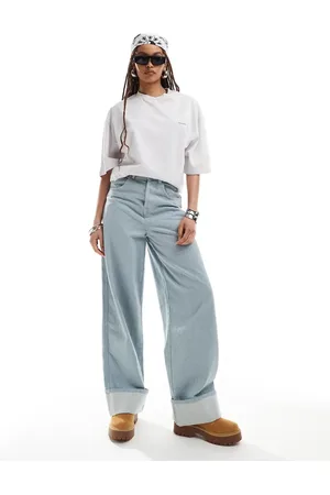 COLLUSION X002 baggy jeans in lightwash blue with turn ups