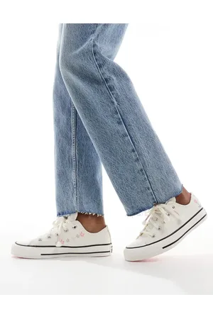 Converse Chuck Taylor All Star Ox trainers in with flower embroidery