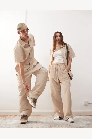 Reclaimed Unisex baggy trouser with contrast stitch in stone