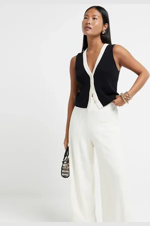 River Island Petite wide leg pleated trouser in cream