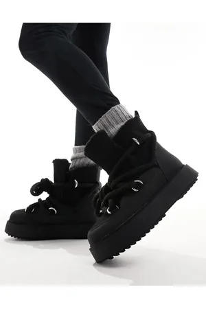 ASOS Alpine shearling lace up snow boots in