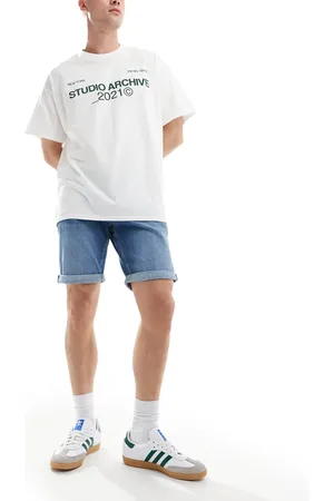 Tommy Hilfiger Scanton slim denim shorts in mid wash