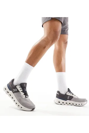 On Running ON Cloudrunner 2 Waterproof running trainers in and navy
