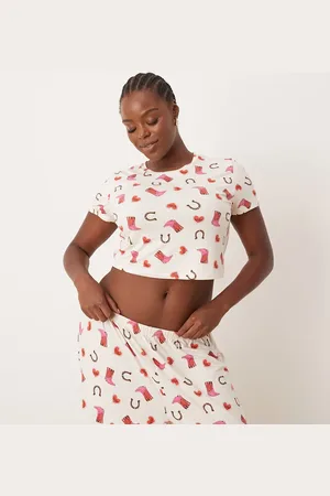Urban Threads Curve poly t-shirt and trouser pyjama set in cowboy boot print
