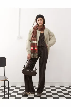 COLLUSION Low rise pinstripe trousers in