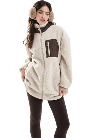 ONLY Roll neck teddy fleece jacket in beige with brown pocket detail