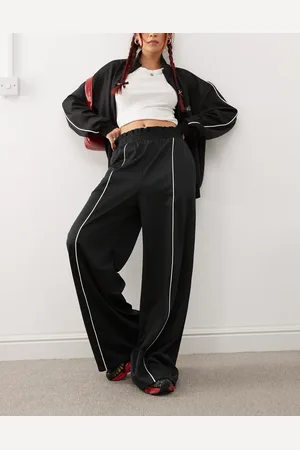 Monki Wide leg pull on track pant with front stripe in