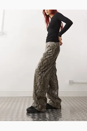 COLLUSION X015 PU baggy trousers in snakeprint