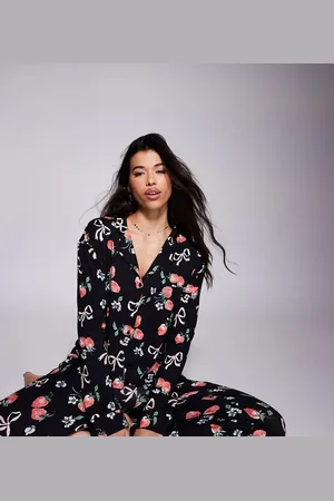 Kaiia Exclusive mix and match cropped button through pyjama top co-ord in dark base strawberry bow print