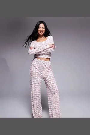 Kaiia Exclusive pyjama bottoms co-ord in cream & red bow print
