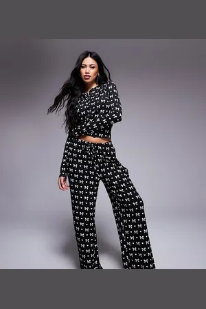 Kaiia Exclusive pyjama bottoms co-ord in black & white bow print