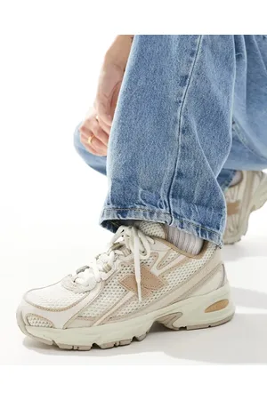 New Balance 740 trainers in beige and tan