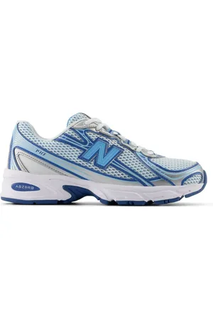 New Balance 740 trainers in white and