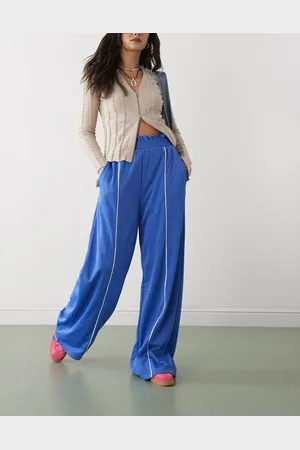 Monki Wide leg pull on track pant with white piping in