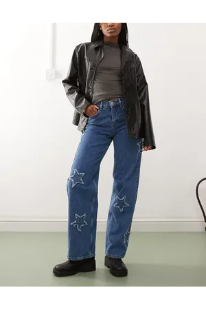 Noisy May Wide leg jeans with star patches in mid wash