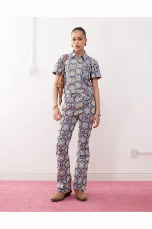 Wrangler Co-ord bootcut 70s print jeans in blue