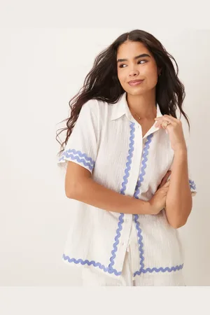 Iisla & Bird Ric rac trim short sleeve beach shirt co-ord in