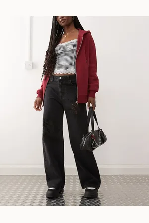 Monki Missy low waist loose fit jeans with lace cur out detail in