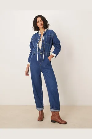 ASOS Premium collarless denim jumpsuit in midwash