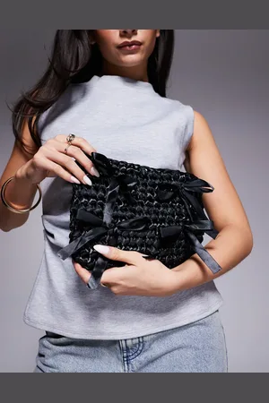 True Decadence Woven bow mini bag in black