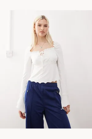 Reclaimed Flared sleeve lace trim blouse in ecru
