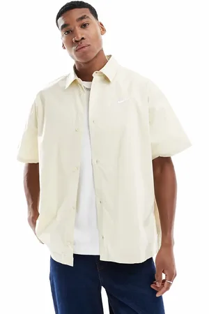 Nike Club woven shirt in beige