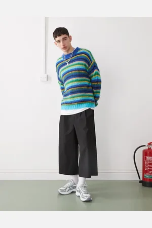COLLUSION Tailored longline shorts in